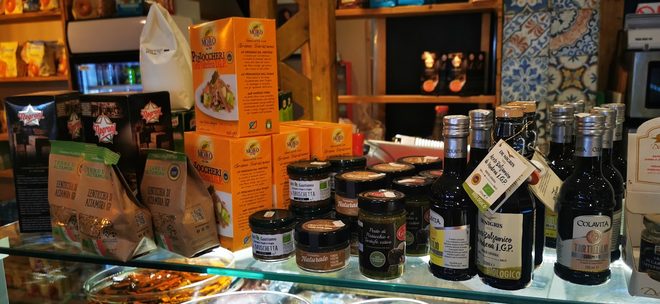 Jars, preserves, oils and vinegars on a shelf